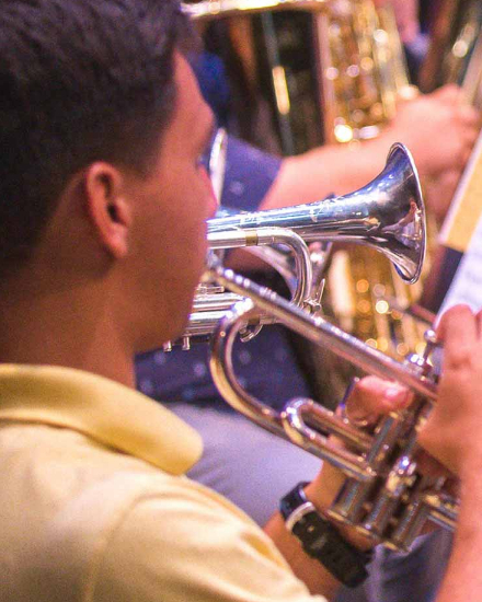 Student Playing in School Band